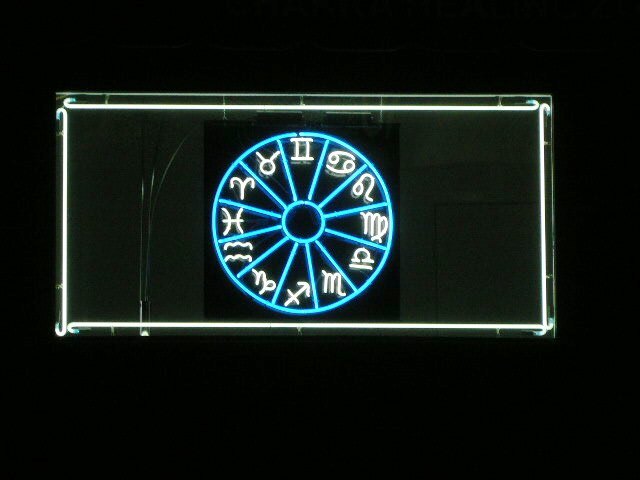 Interior Neon Sign Mounted On A Black Acrylic Piece