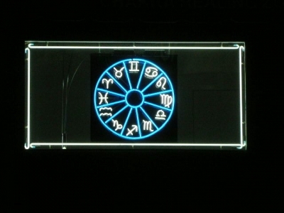 Interior Neon Sign Mounted On A Black Acrylic Piece